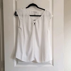 White sleeveless blouse